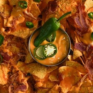 Spicy Nacho Cheese Tortillas with Crispy Bacon & Fresh Jalapeños