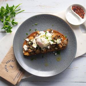 Sourdough Toast Topped with Mushrooms, Goat's Cheese & Poached Egg